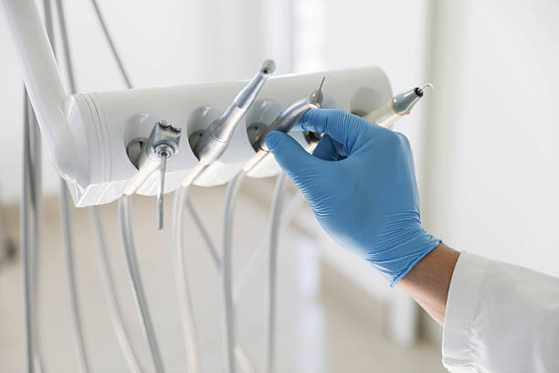 Professional Tooth Extraction technician working in Livingston, TX
